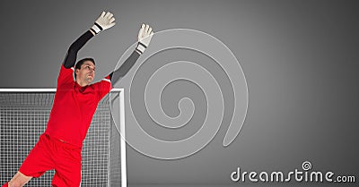 Soccer goalkeeper saving in goal Stock Photo