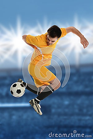 Soccer Player Doing Back Kick Stock Photo