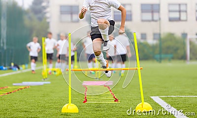 Soccer Player on Fitness Training. Footballers on Practice Session in Field on Sunny Day Stock Photo