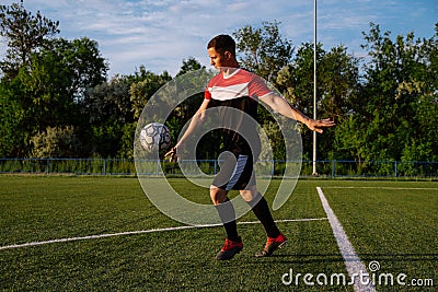 Soccer player kicks the ball.Football sports concept Stock Photo