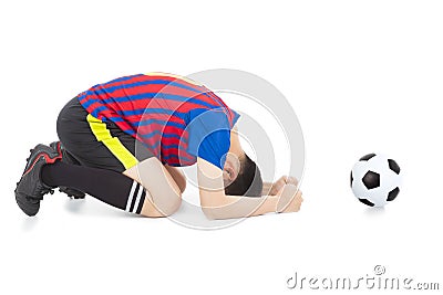 Soccer player lose the game and kneel down Stock Photo