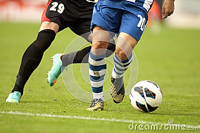 Soccer player protecting a ball Editorial Stock Photo