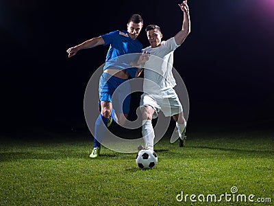 Soccer players duel Stock Photo