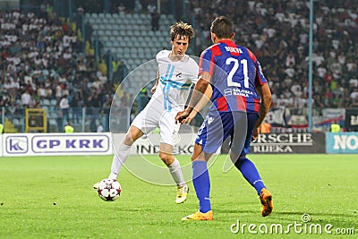 Soccer players in duel Editorial Stock Photo