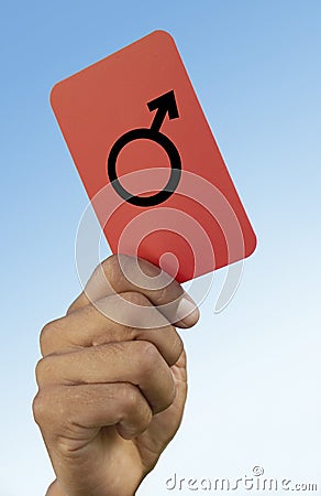 Soccer referee holding up red card close-up on hand Stock Photo