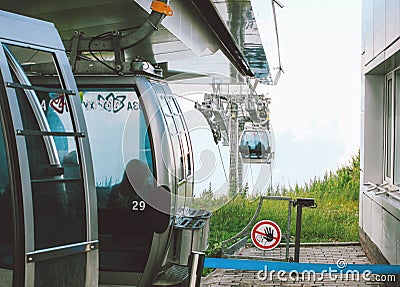 Sochi, Russia - August, 06, 2019. View Cable Car on ropeway in mountain resort of Rosa Khutor Editorial Stock Photo