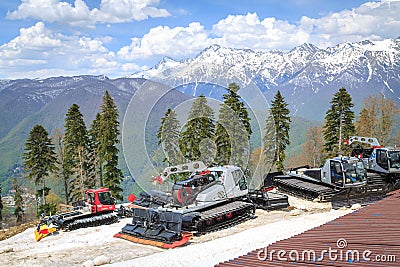 SOCHI, RUSSIA, 02 MAY 2017: Special machines for the preparation of ski runs on the background of mountains Editorial Stock Photo