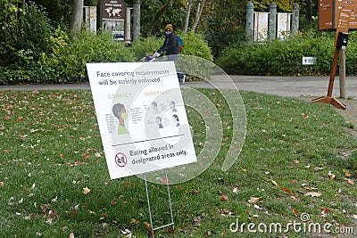 Social distancing and mask sign during covid pandemic Editorial Stock Photo