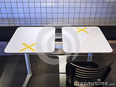 Social distancing in Restaurant cafe Table seat position with space Stock Photo