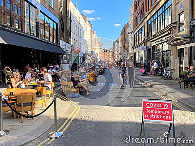 Social distancing street seating in Soho, London July 2020 Editorial Stock Photo