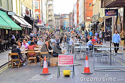 Outdoor street seating in Old Compton Street, Soho, London 2020 Editorial Stock Photo