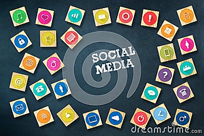 Social media concept with social icons on wooden blocks. Dark blue background.C Stock Photo