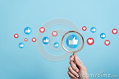 Social media and digital online, Magnifier focus to Like button, Social media. Stock Photo