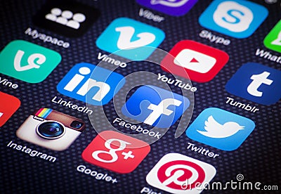 Social media icons on iPhone screen. Editorial Stock Photo
