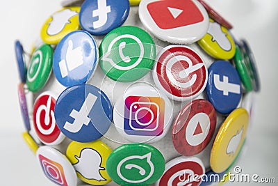 Social media logos such as youtube facebook whatsapp pinterest and instagram as the center of daily work Editorial Stock Photo