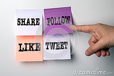 Social media and marketing. Share, like, tweet and follow concept Stock Photo