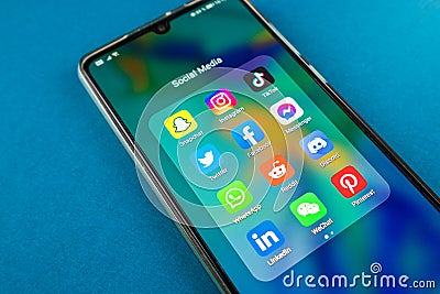 Social media platform apps on mobile phone. Editorial Stock Photo