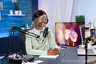 Social media star talking at camera and recording a new episode Stock Photo