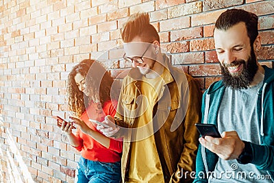 Social networking millennials smartphones surfing Stock Photo