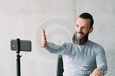 Social vlog man smartphone encourage subscribers Stock Photo