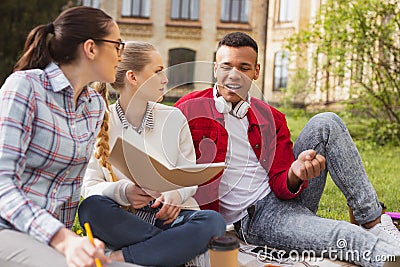 Socially active students conveying university poll Stock Photo