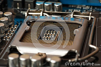 Socket for processor on circuit board. Electronic microchip computer hardware technology. Printed motherboard digital equipment Stock Photo