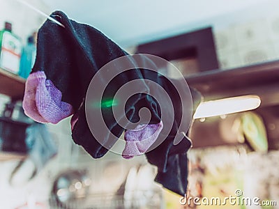 Socks are dried on a rope Stock Photo