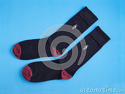 Socks for men in blue and astronaut - Blue background Stock Photo