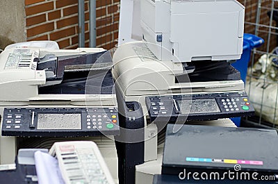 Soest, Germany - January 1, 2019: Different broken multi-function printers Editorial Stock Photo