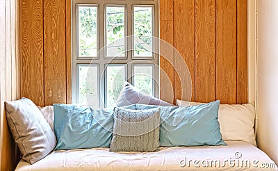 Sofa bed in wooden cottage style room Stock Photo