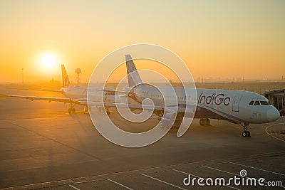 SOFIA, BULGARIA - March, 2019: Indigo commercial airplanes at sunrise at the airport ready to take off. Plane flight delays, Editorial Stock Photo