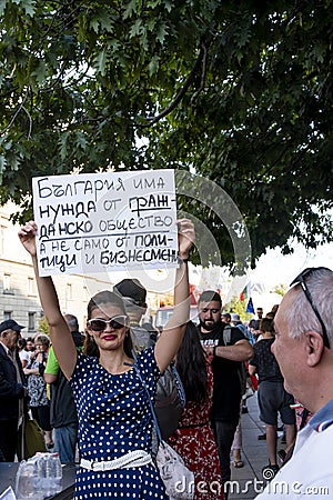 Demonstrators holding posters during the 76-th day of anti-government protests against corrupt politicians Editorial Stock Photo