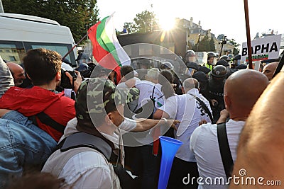 Clashes between the gendarmerie and protesters during an anti-government protest in front of the parliament building in Sofia, Bul Editorial Stock Photo