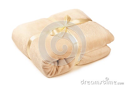 Soft beige fleece blanket gift, folded Stock Photo