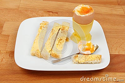 Soft boiled egg and toast soldiers Stock Photo
