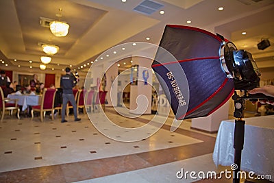 Soft-box Diffuser for Speed-light Speed-lite Quantum Flash . The birthday uses a soft-box for shooting Editorial Stock Photo