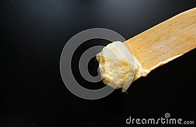 Soft butter on spatula Stock Photo