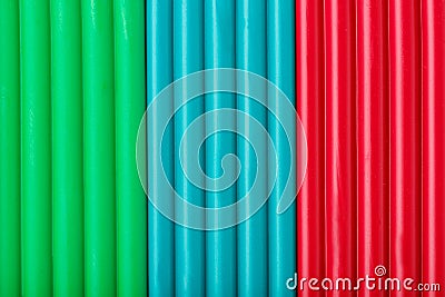 Soft clay from briquettes of green, blue and red color for modeling. Plastic colorful material for children art education Stock Photo