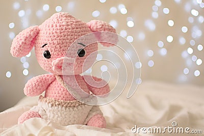 Soft toy pig, crochet animal amigurumi Stock Photo