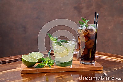 soft drinks lemon and cola in glass Stock Photo