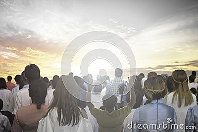 Soft focus of christian people group raise hands up worship God Jesus Christ together in church revival meeting with image of wood Editorial Stock Photo