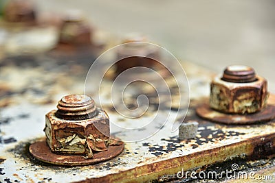 Soft focus of Corrosive rusted bolt with nut.Rusty Old Industrial Nut and Bolt Stock Photo