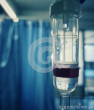 Soft focus of set intravenous drop with blue blurry background in hospital, health care concept. Stock Photo