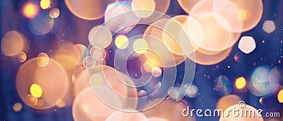 Soft, glowing bokeh lights create a dreamy atmosphere in an evening setting with subtle color variations Stock Photo