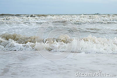 Soft ocean wave on sandy beach Stock Photo