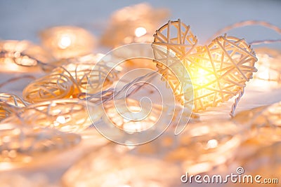 Soft pastel Orange Lamp in Bamboo baskets in the heart shape Stock Photo