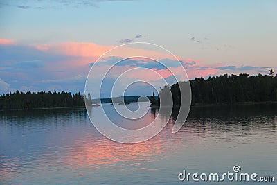 Soft peach toned sunset, Lake of the Woods, Kenora, Ontario Stock Photo