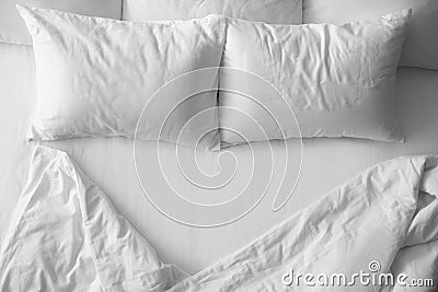 Soft pillows on comfortable bed Stock Photo