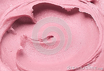 Soft pink cosmetic clay facial mask, cream texture close up, selective focus. Abstract background with brush Stock Photo