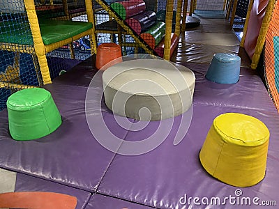 Soft play area with 5 soft multicoloured pillars Stock Photo